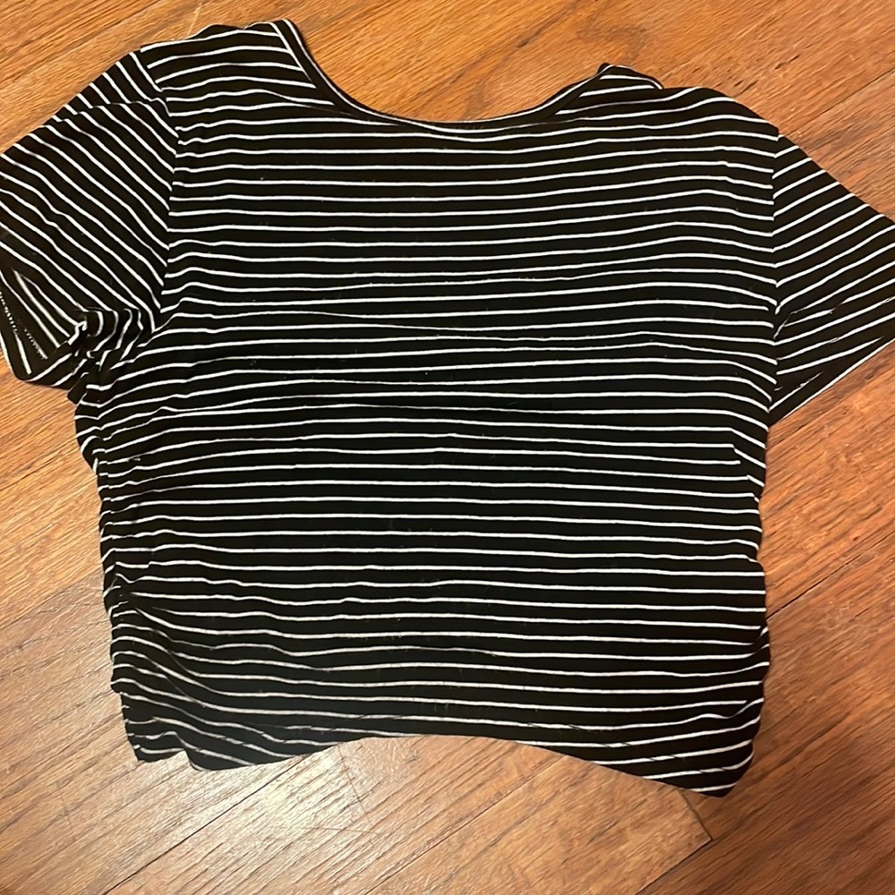 Striped black and white kind of fitted tee. Brand is Antistar. XS.